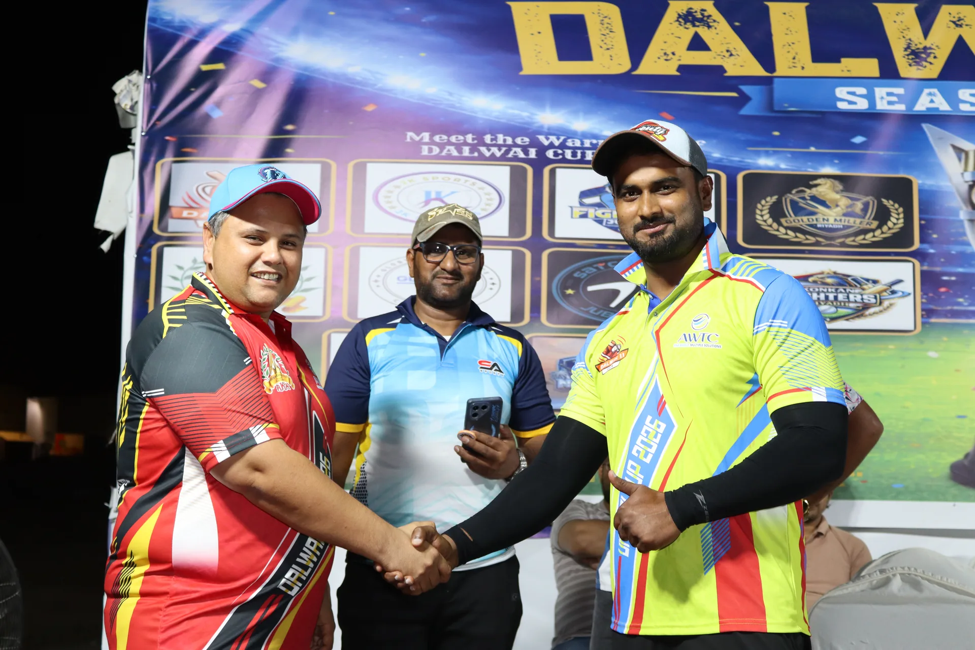 A handshake between captains